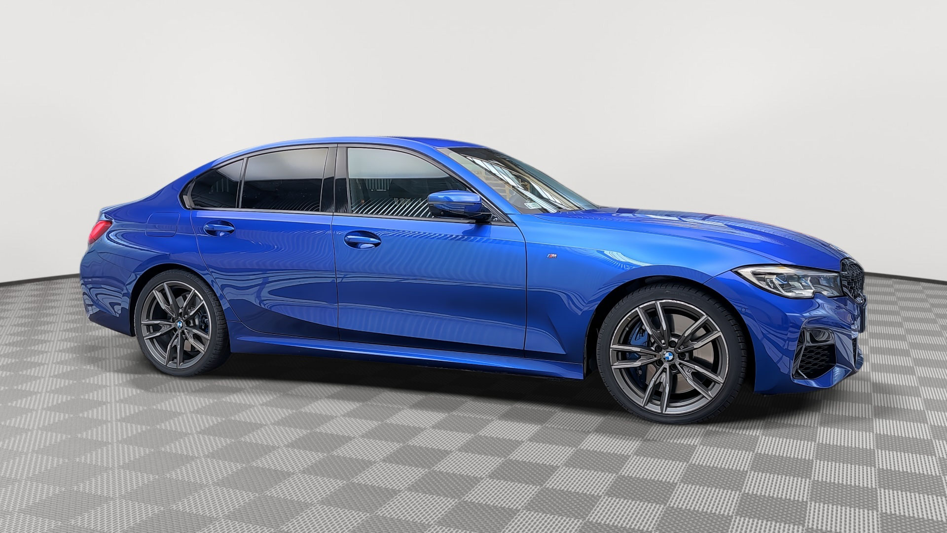Blue BMW vehicle with generic background